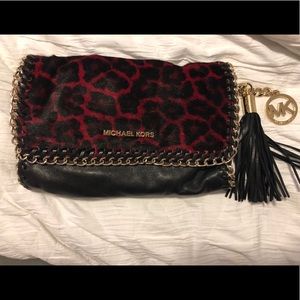 Michael Kors “Chelsea” clutch/crossbody luxury bag